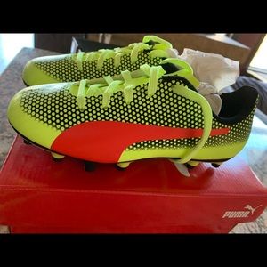 Kids size 1.5 Puma Spirit FG soccer shoes. Never worn and still in box.